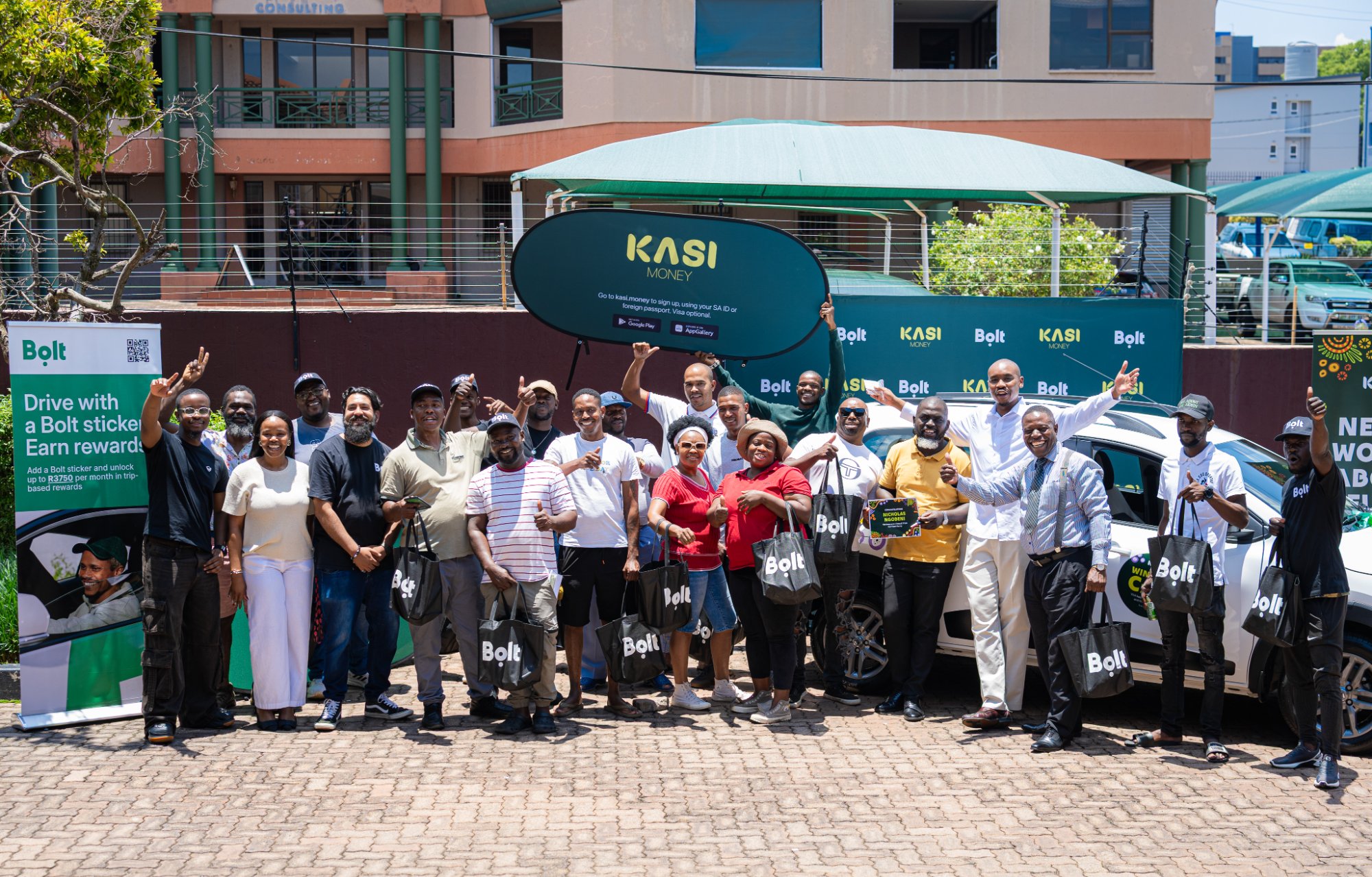 Bolt drivers celebrating vehicle ownership with Kasi Money partnership